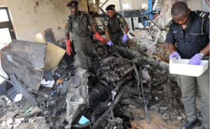Nigeria: Đánh bom tòa soạn, 40 người chết - 1