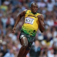 Bolt dễ dàng vào chung kết chạy 200m