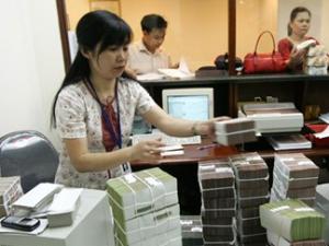 Kinh doanh - Cổ phiếu ngân hàng có thể chạm đáy năm 2015