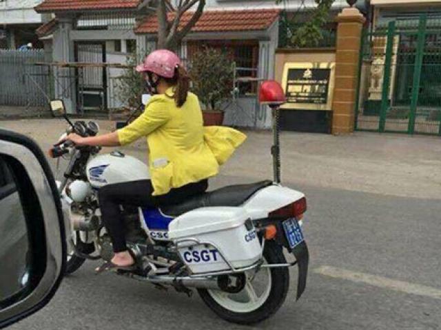Tin tức trong ngày - Cô gái mặc áo vàng đi xe đặc chủng CSGT là nhân viên sửa xe