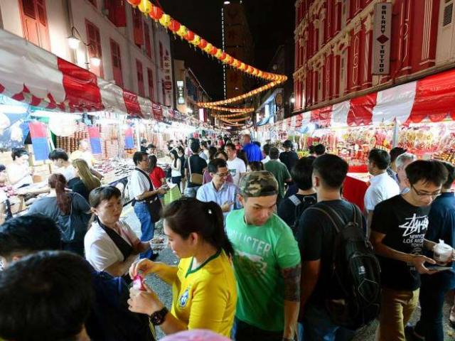 Thế giới - Người Singapore “thắt lưng buộc bụng” dịp Tết năm nay