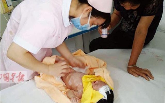 Tin tức trong ngày - TQ: Bị chôn 8 ngày, bé trai sơ sinh vẫn sống sót thần kỳ