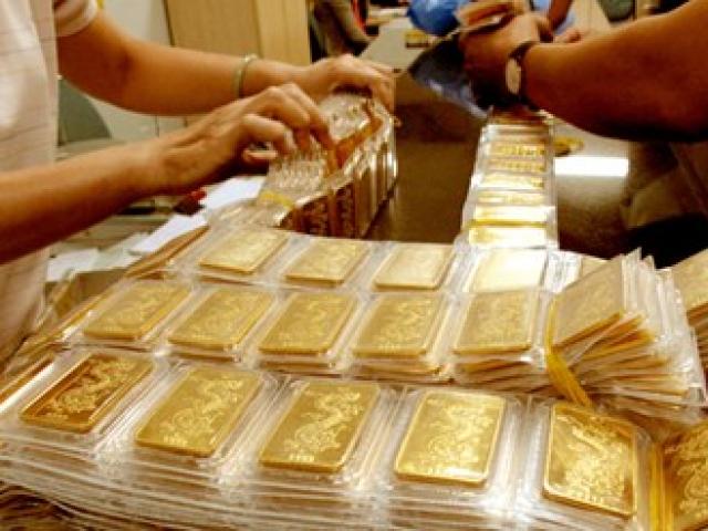 Tài chính - Bất động sản - Vàng bật tăng, tỷ giá USD "hạ nhiệt"