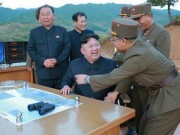 Thế giới - Kim Jong-un tươi cười ăn mừng phóng tên lửa &quot;hạt nhân&quot;