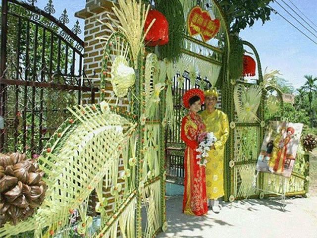 Bạn trẻ - Cuộc sống - Mê mẩn những cổng lá dừa "chất lừ" của đám cưới Việt