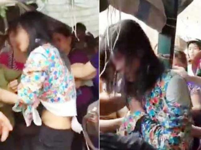 Tin tức trong ngày - Bắt quả tang phụ nữ trộm túi tiền, dân đem trói giữa chợ