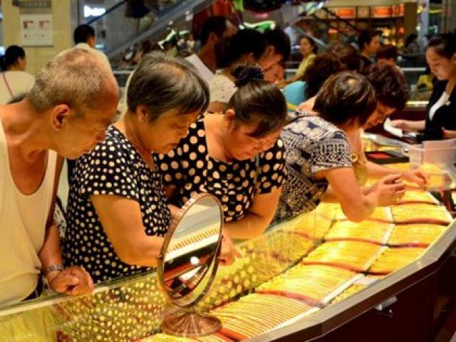 Tài chính - TQ: Nhân dân tệ mất giá vẫn không "khát vàng"?