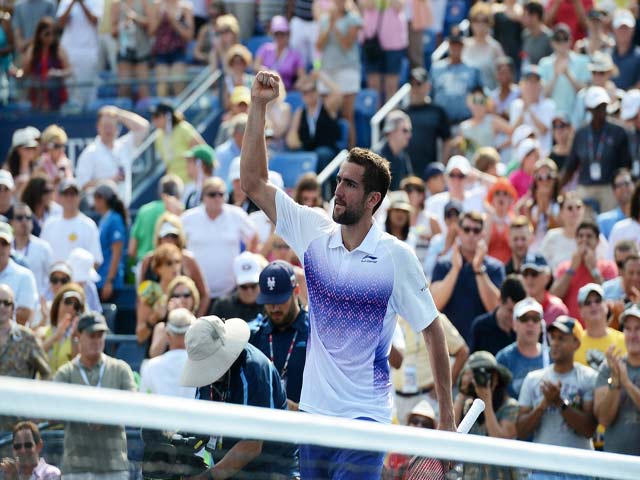 Thể thao - US Open ngày 5: ĐKVĐ Cilic khổ chiến