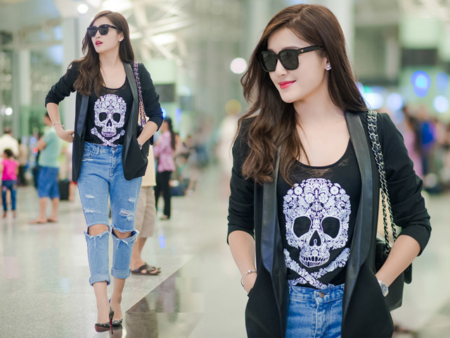 Người mẫu - Hoa hậu - Huyền My "hầm hố" với áo đầu lâu, jeans rách ở sân bay