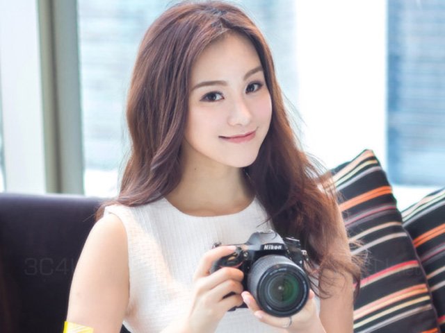 Thời trang Hi-tech - Ngắm mỹ nữ rạng ngời bên máy ảnh Nikon