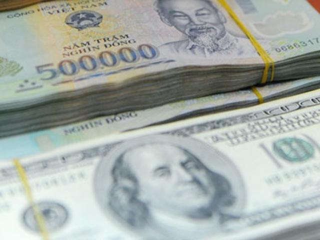 Tài chính - Lãi suất tiền gửi USD kém VND 5%: Lợi khi gửi tiền đồng