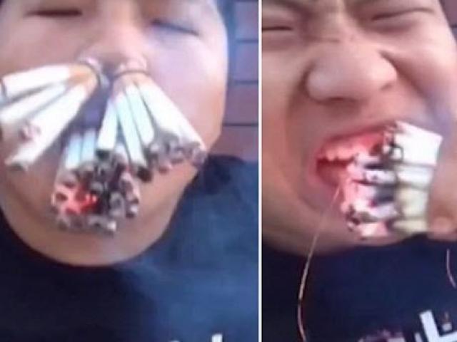 Phi thường - kỳ quặc - Video: Nhét hơn 30 điếu thuốc lá đang cháy vào mũi, miệng