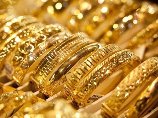 Tài chính - Bất động sản - Giá vàng chiều 7/7: "Lên đỉnh" rồi... rơi tự do