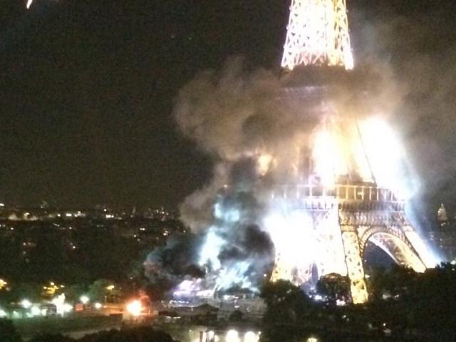 Tháp Eiffel bốc khói dữ dội sau vụ khủng bố ở Pháp