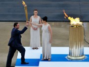 Ai châm đuốc đài lửa Olympic?