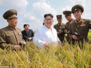 Thế giới - Ảnh Kim Jong-un tươi cười xuất hiện sau đợt lũ lịch sử