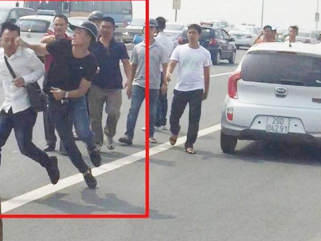 Tin tức trong ngày - Vụ xô xát trên cầu Nhật Tân: CA gạt tay trúng phóng viên