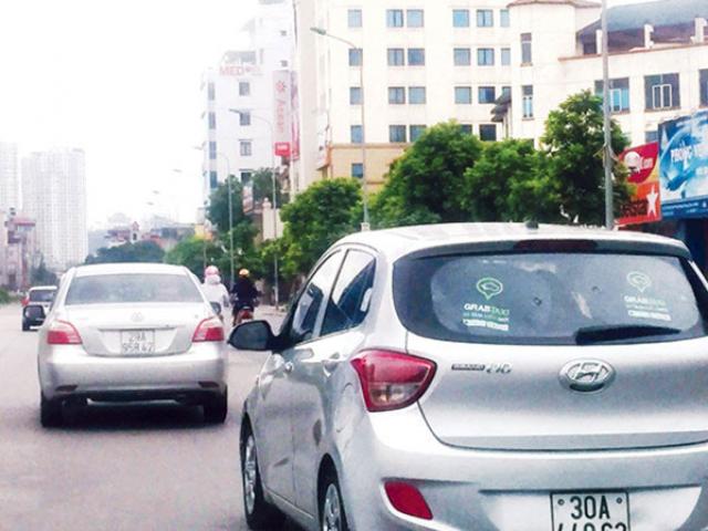 Tài chính - Bất động sản - Cuộc chiến taxi: Không nên chống “máy dệt” để bảo vệ “khung cửi”