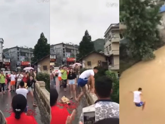 Bạn trẻ - Cuộc sống - Chàng trai TQ nhảy xuống sông cuồn cuộn chảy để cầu hôn bạn gái