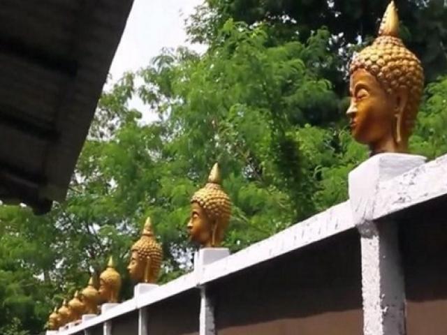 Thế giới - Thái Lan: Đặt 33 đầu tượng Phật trên tường rào để trang trí