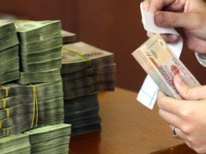 Tài chính - Bất động sản - Chuyển 10 nghìn tỷ đồng vượt thu vào lương