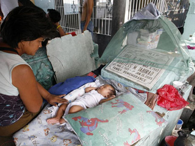 Thế giới - Ảnh: Người sống "ăn ở" cùng người chết ở Philippines