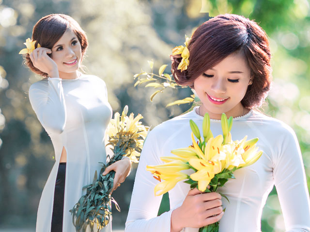 Bạn trẻ - Cuộc sống - "Nữ hoàng điền kinh" xinh tươi trong trang phục áo dài