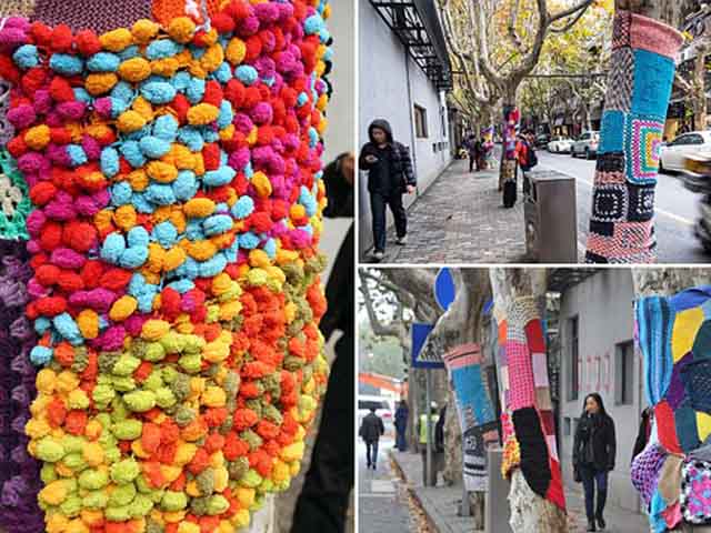 Thế giới - Ảnh: "Mặc" áo len chống rét cho cây trên phố Thượng Hải