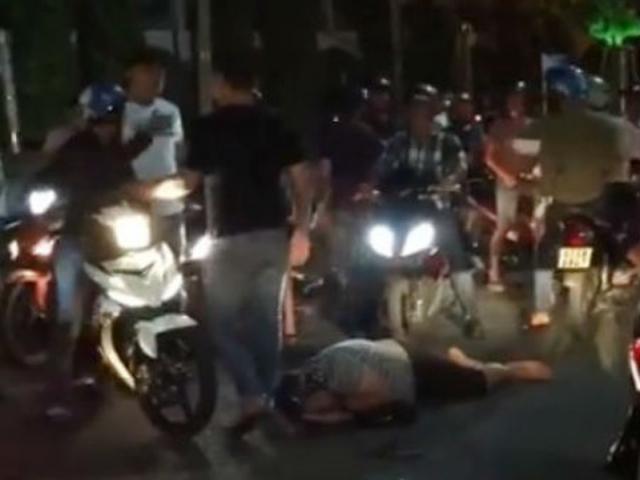 Pháp luật - Bị đánh hội đồng vì dọa "dùng tiền ném chết người"