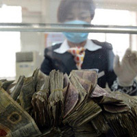 Tin tức trong ngày - TQ: Vác 11 bao tiền lẻ đi gửi ngân hàng