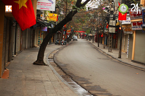 Hà Nội, TP.HCM lạ lẫm ngày đầu xuân - 4
