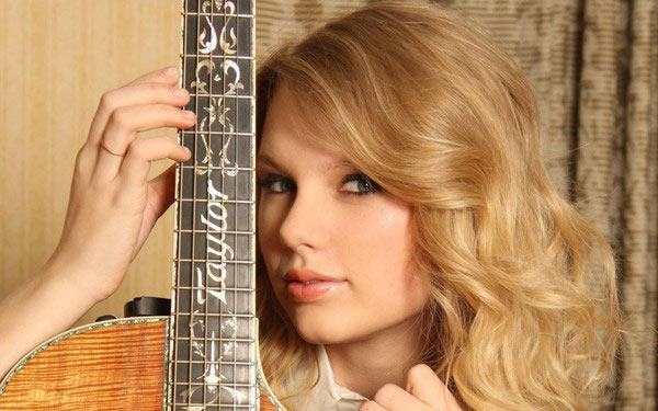 Taylor Swift bị kiện vì "ăn không" 52 tỉ đồng - 1