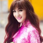 Xu hướng thời trang - Hot girl Kelly đằm thắm với áo dài Xuân