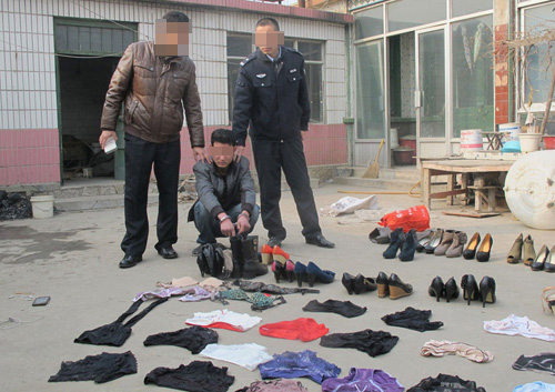 Trung Quốc: Bị bắt vì ăn trộm đồ lót phụ nữ - 1