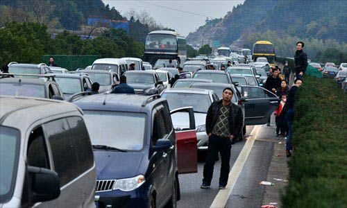 Dân TQ chật vật đổ về thành phố sau Tết - 8