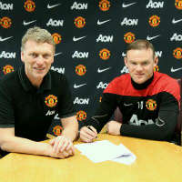 Bóng đá - Rooney chính thức ở lại MU với mức lương kỷ lục