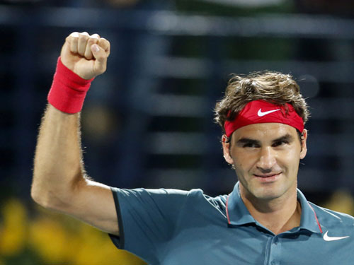 Federer hóa giải đòn tấn công của Djokovic - 1