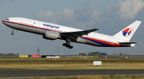 Công sở “nóng” vụ máy bay MH370 mất tích - 1