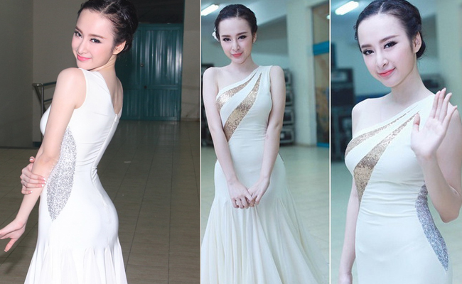 Chiếc váy ômg sát với những họa tiết điểm nhấn ở eo và trước ngưc tôn lên 3 vòng tuyệt mỹ của Angela Phương Trinh.