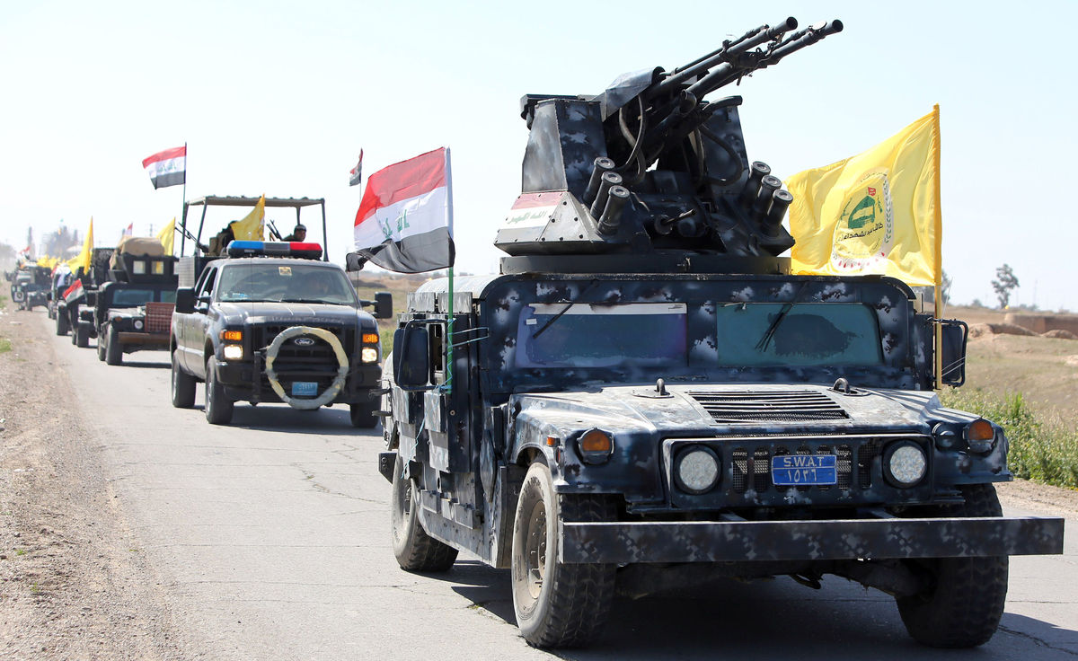 Iraq tập kết 27.000 quân tấn công quê hương Saddam Hussein - 1