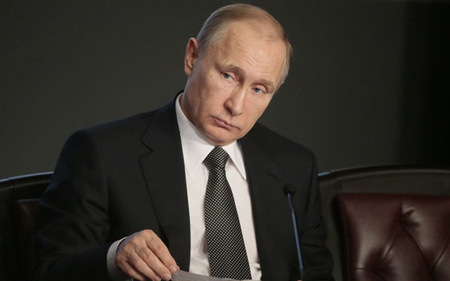 Tổng thống Putin tự cắt giảm 10% lương của chính mình - 1