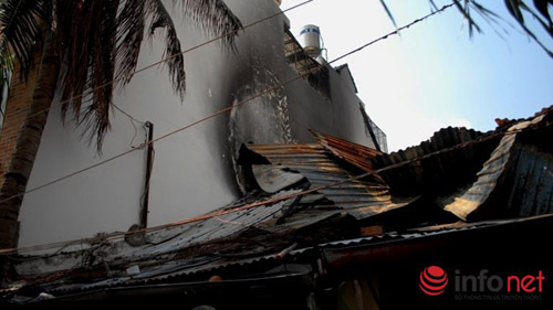 Nước mắt chảy dài sau vụ cháy 8 căn nhà giữa Sài Gòn - 1