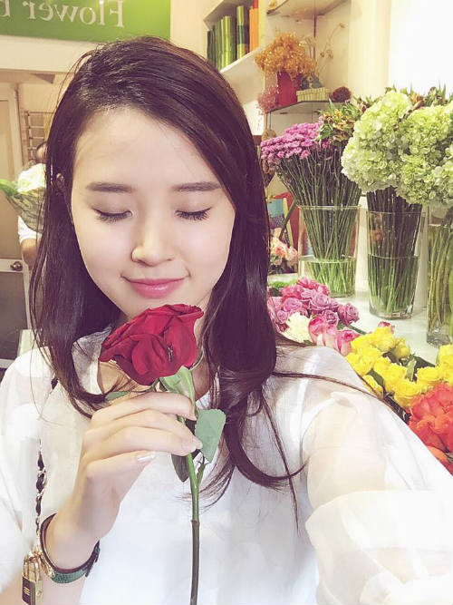 Midu đẹp rạng rỡ giữa rừng hoa anh đào - 11