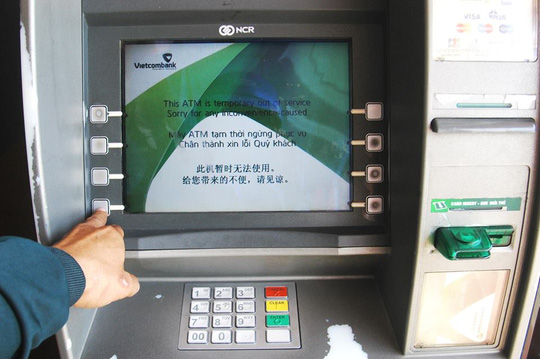 90% giao dịch là rút tiền, hỏi sao ATM không quá tải? - 1
