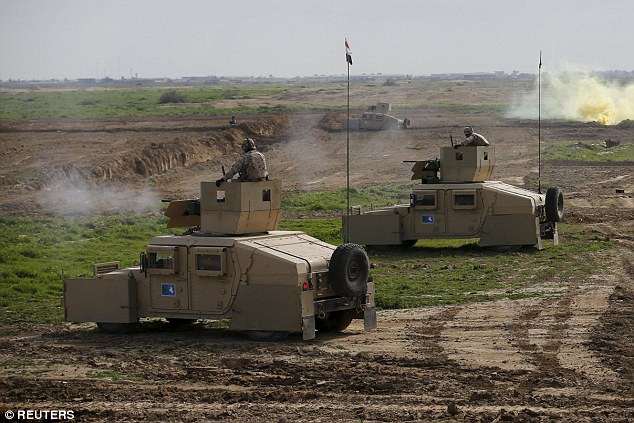 Iraq đào hào, xây tường quanh thủ đô để ngăn IS - 1