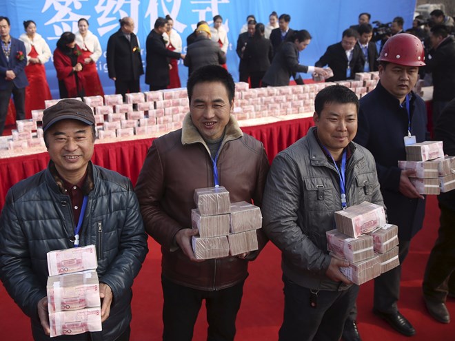 TQ đang thâu tóm các công ty Mỹ với tốc độ chóng mặt - 1