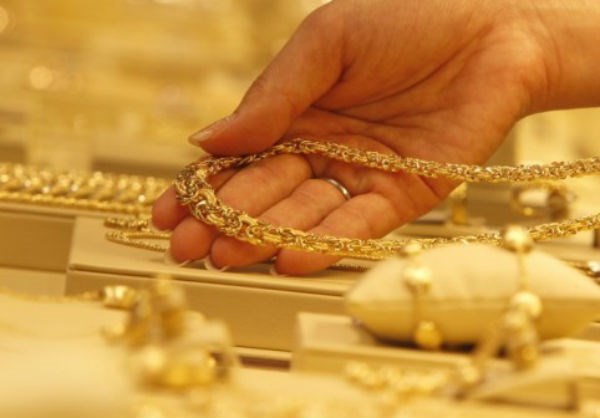 Giá vàng trong nước bật tăng 150.000 đồng/lượng - 1