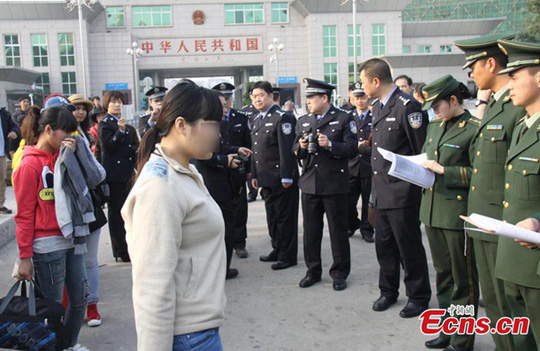 Cảnh sát Trung Quốc giải cứu 32 “cô dâu” người Việt - 1