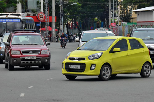 Grab, Uber và taxi truyền thống: Ai khổ vì ai! - 1