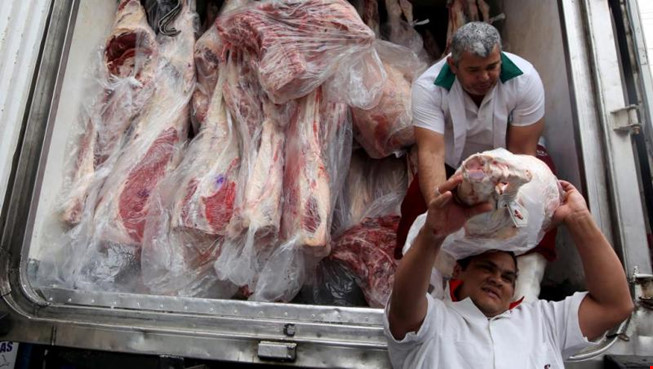 Việt Nam tạm ngừng nhập khẩu thịt từ Brazil - 1
